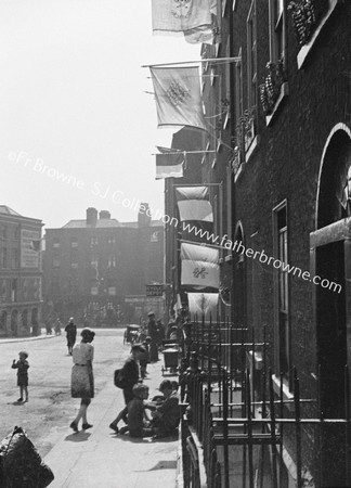 STREET SCENE WITH FLAGS